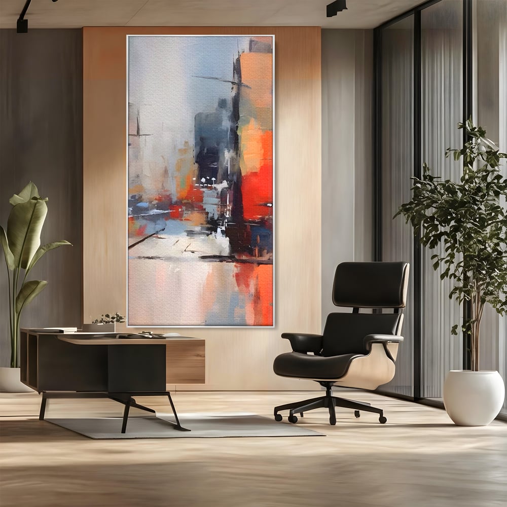 Tablou canvas cu pictura abstracta cu oras si cladiri, in rama de aluminiu argintiu, pe perete intr-un birou